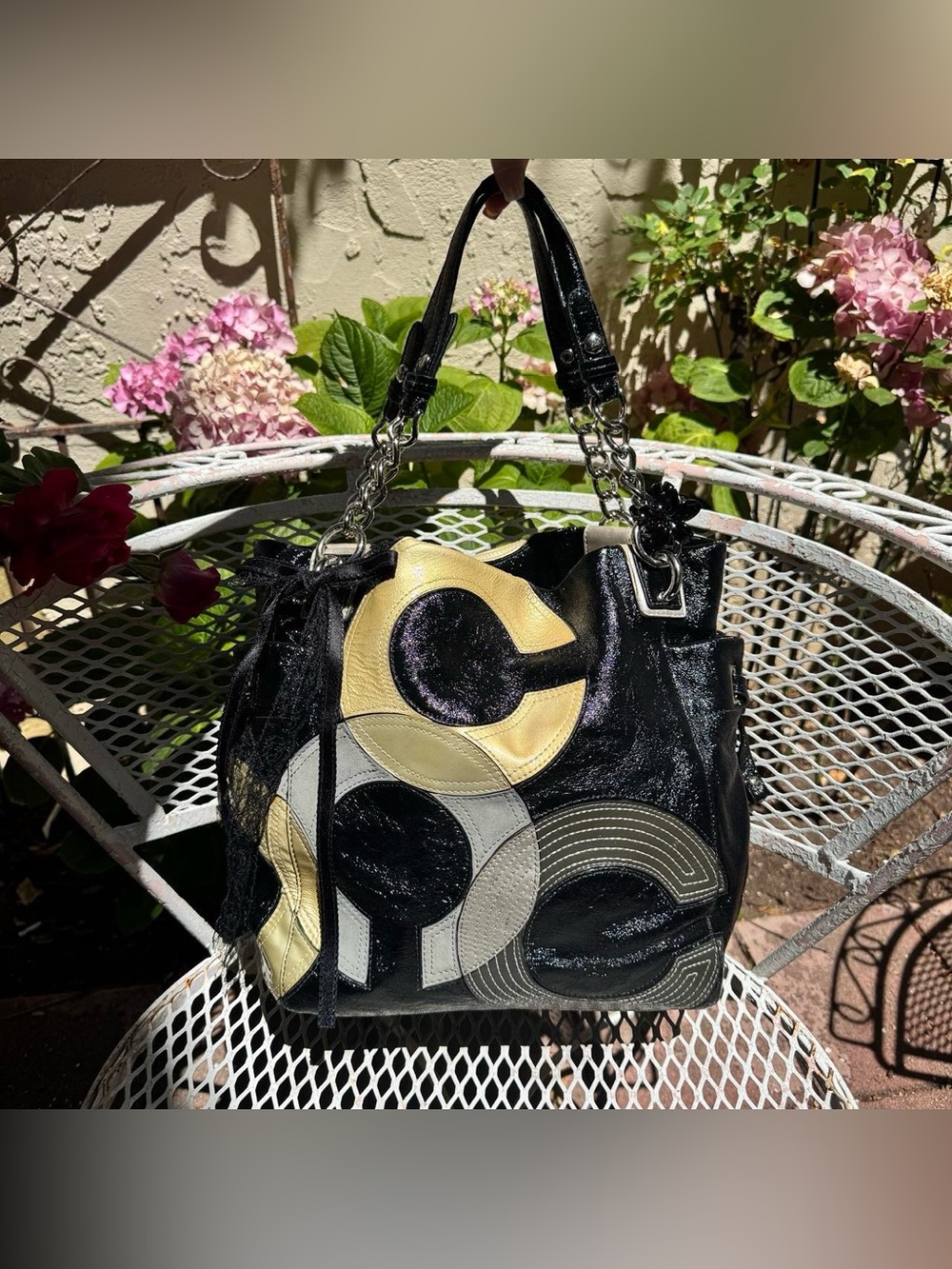 Stylish Black Patchwork Tote Bag with Metallic Accents